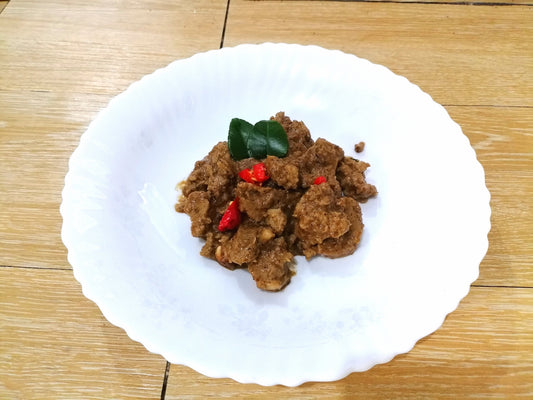 Authentic Indonesian Vegan Rendang made from scratch with homemade wheat gluten, coconut milk, and traditional spices. 100% plant-based, 250g.