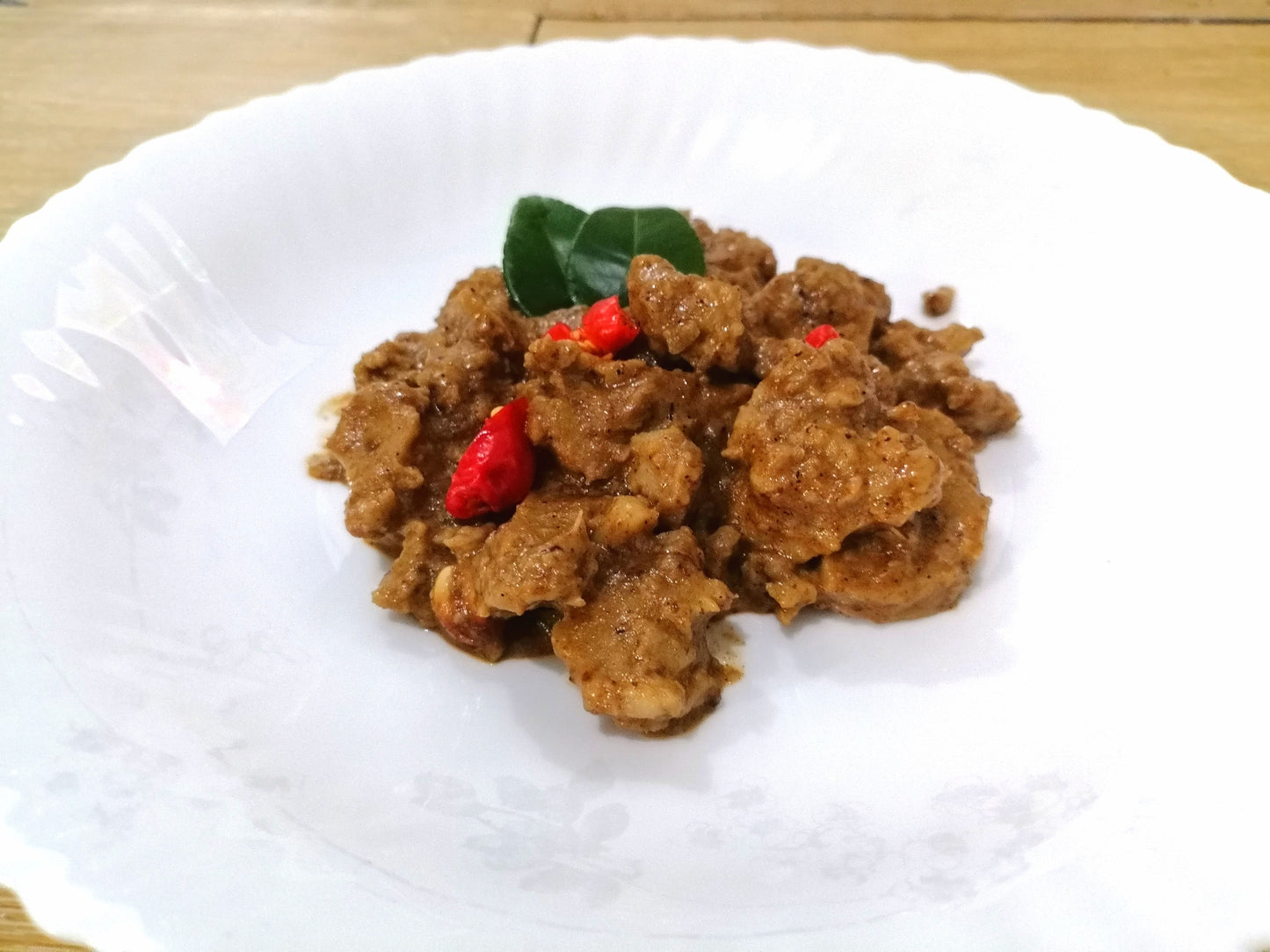 Authentic Indonesian Vegan Rendang made from scratch with homemade wheat gluten, coconut milk, and traditional spices. 100% plant-based, 250g.