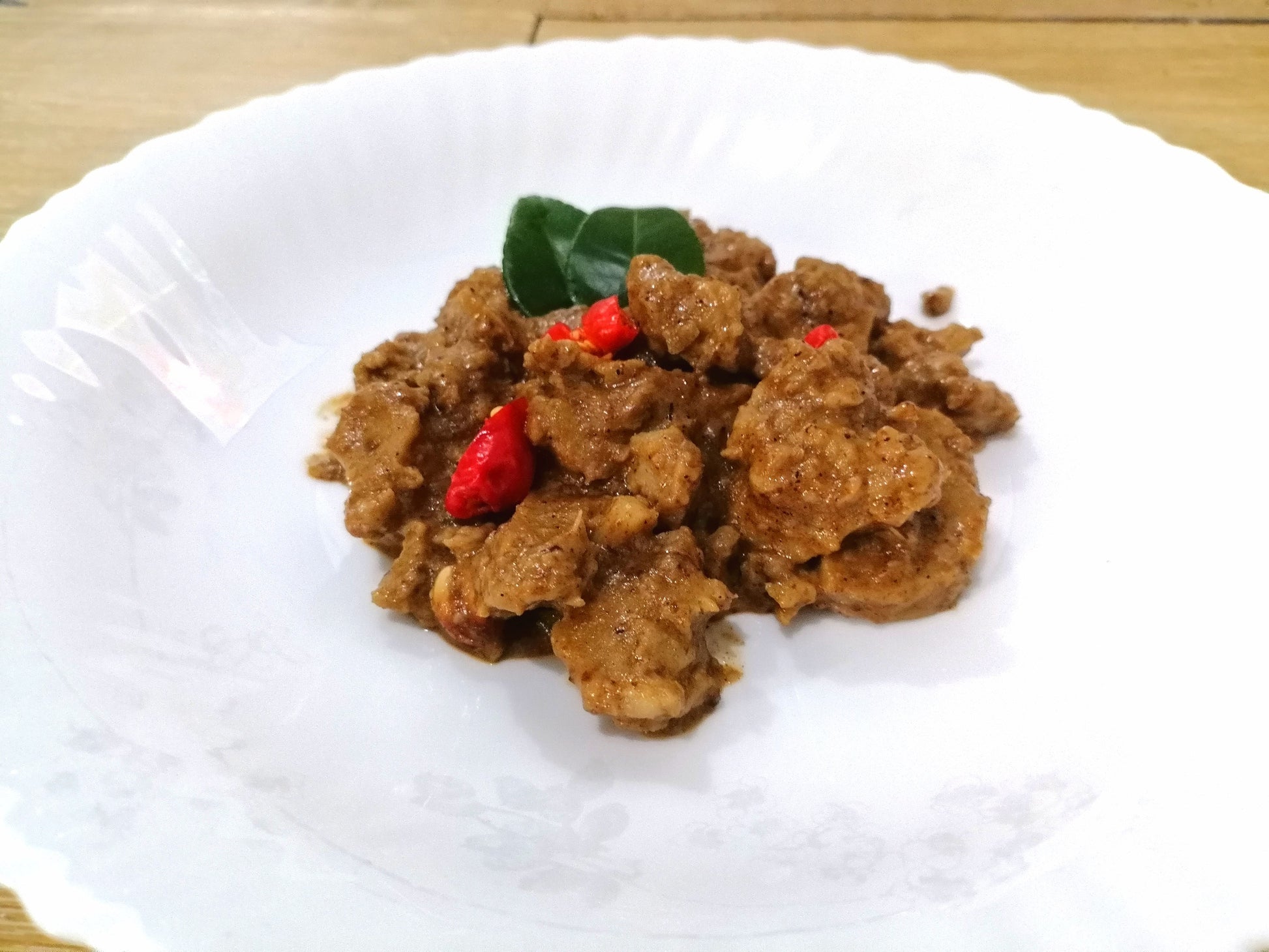 Authentic Indonesian Vegan Rendang made from scratch with homemade wheat gluten, coconut milk, and traditional spices. 100% plant-based, 250g.